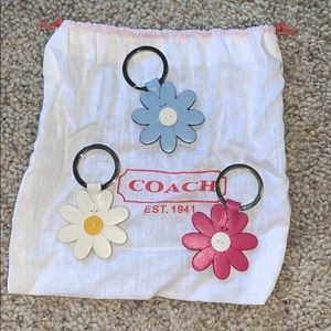 Coach flower keychains